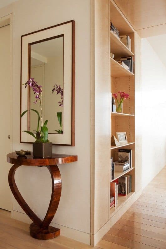 Entry Way Ideas: Stunning Console Table with Mirror and Built-In Bookshelf for Small Spaces
