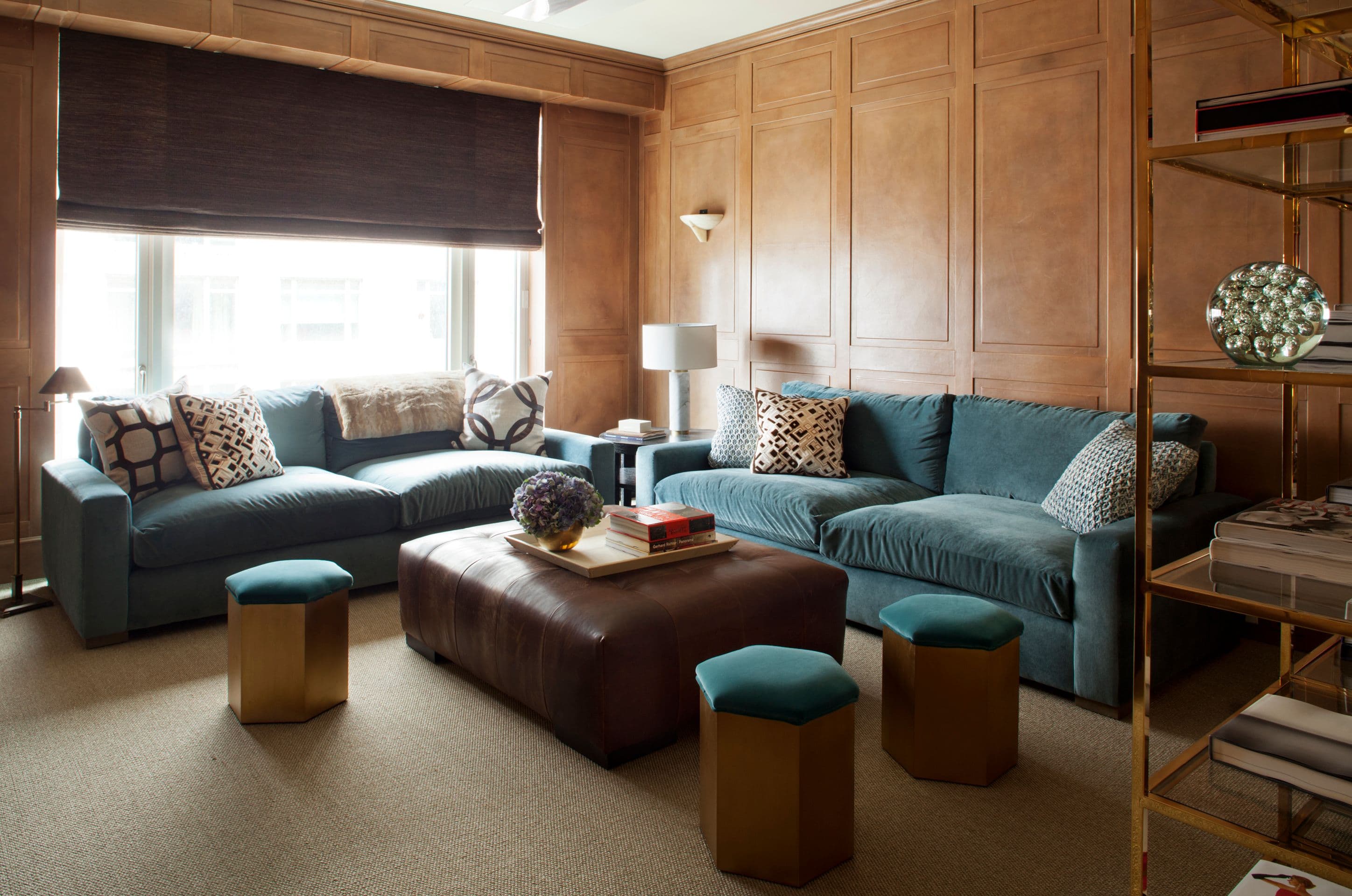 How to Design a Teal and Wood Paneled Living Room Like a Pro